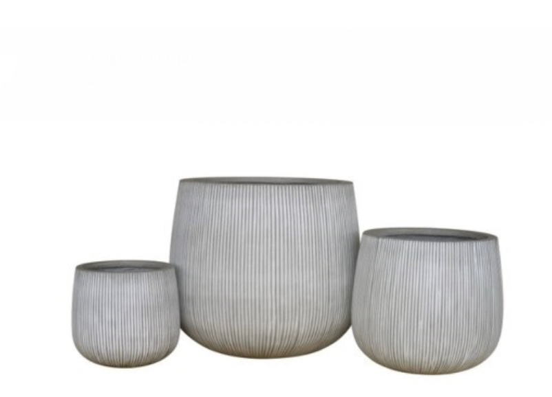 Large ficonstone planter for indoors or outdoors. vertical stripes. glazed in an off white finish