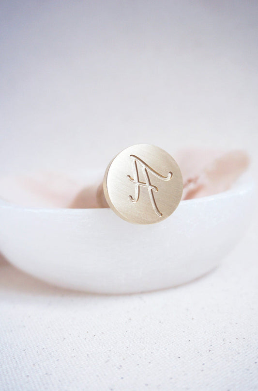 Letter wax stamp (cursive)