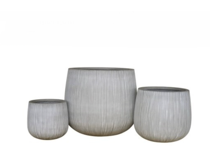 Large ficonstone planter for indoors or outdoors. vertical stripes. glazed in an off white finish 